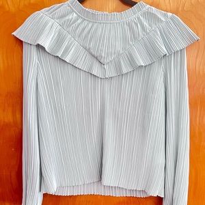 J. Crew mint green blouse with pleats.